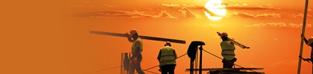 construction workers working under the hot sun
