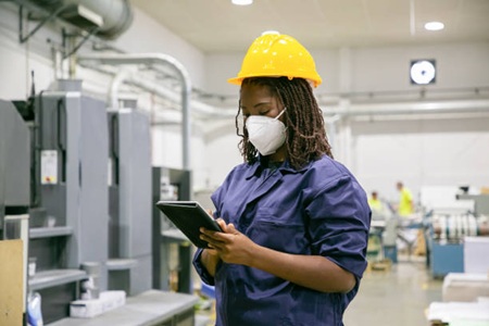 African woman wearing PPE
